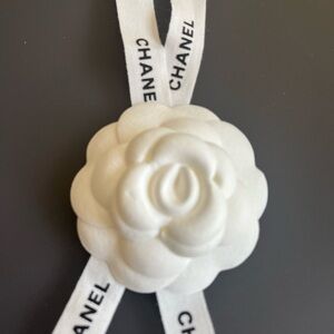 Chanel white camellia with ribbon